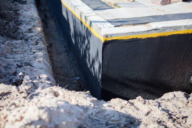 Professional Waterproofing technician working in West Long Branch, NJ